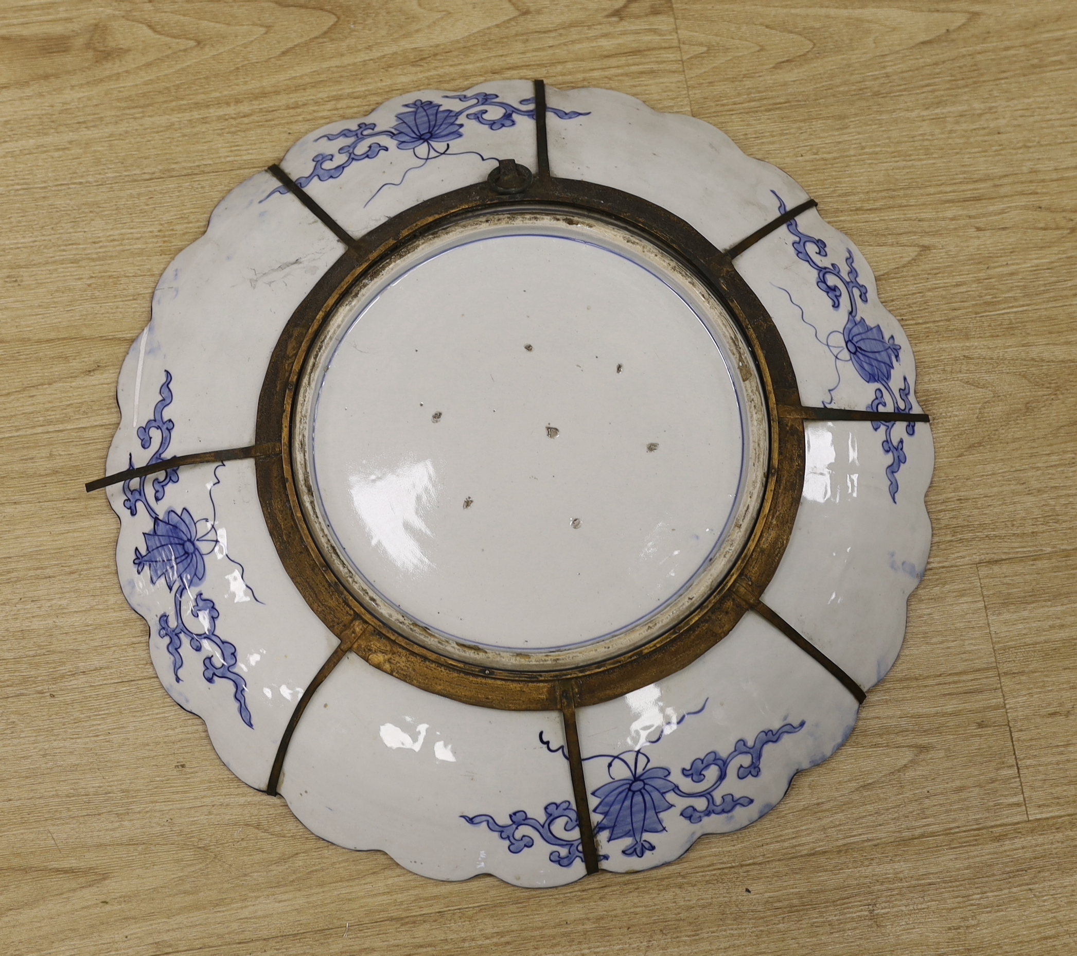 A large Japanese Imari floral charger, 58cm diameter